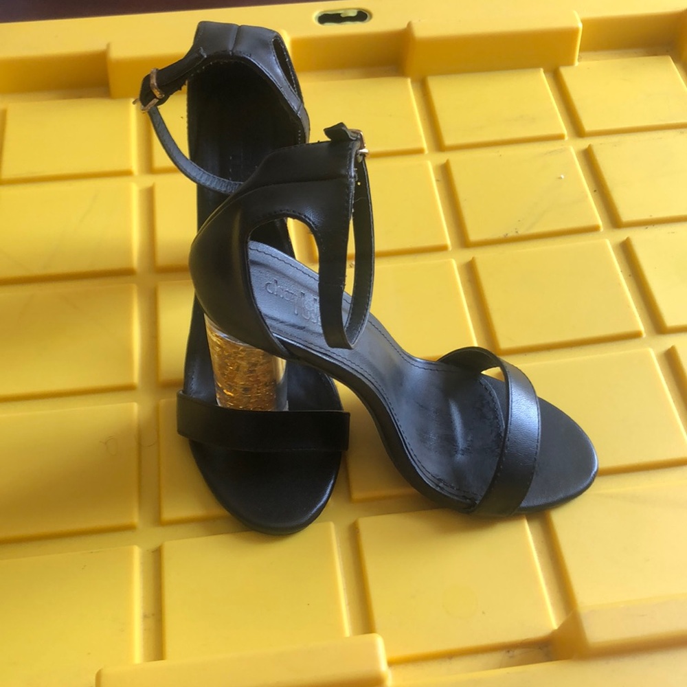 A black date night with gold details in the heel.